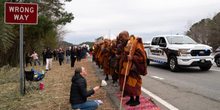 A group of Buddhist monks walked Pittsboro to Apex in North Carolina as part of their “Walk for Peace.”
Nearly two dozen monks from the Huong Dao Vipassana Bhavana Center, led by Bhikkhu Pannakara, are walking 2,300 miles to promote national healing, unity and compassion. The journey began Oct. 26 in Fort Worth and is expected to conclude Feb. 12.