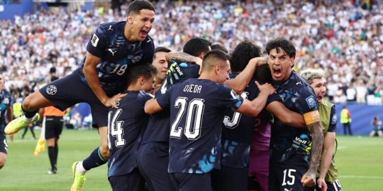 Paraguay's defender #15 Gustavo Gomez (r) and teammates celebrate after winning the penalty shootout of the 2026 World Cup round of 32 football match between Germany and Paraguay at the Boston Stadium in Foxborough on June 29, 2026.  (Photo by CHARLY TRIBALLEAU / AFP)