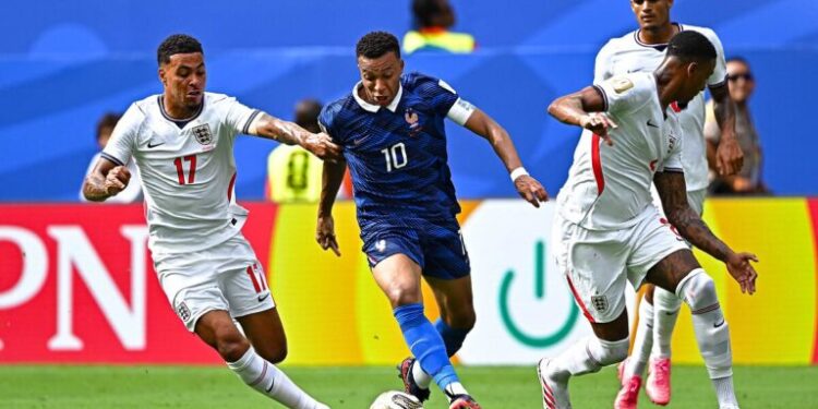 Kylian MBAPPE of France and Morgan ROGERS of England during the 2026 FIFA World Cup - 3rd place match between France and England at Hard Rock Stadium on July 18, 2026 in Miami Gardens, Florida. (Photo by Baptiste Fernandez/Icon Sport/Sipa USA)