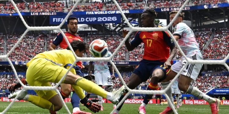 Spain's midfielder #06 Mikel Merino scores his team's second goal during the 2026 World Cup football tournament quarter-final match between Spain and Belgium at the Los Angeles Stadium in Inglewood on July 10, 2026.  (Photo by Paul ELLIS / AFP)